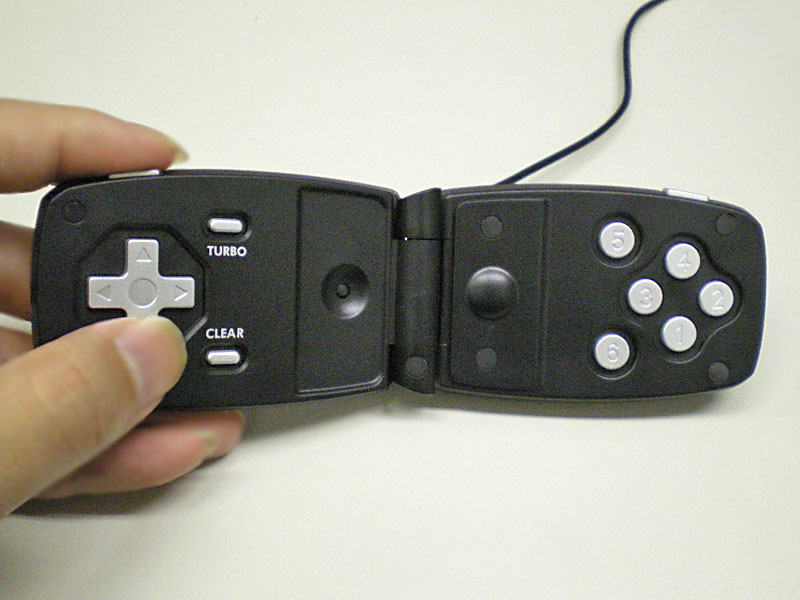 Illustration for article titled Evergreen Genius Navigator 365: It's a Mouse! It's a Gamepad! It's a Gamemousepad!